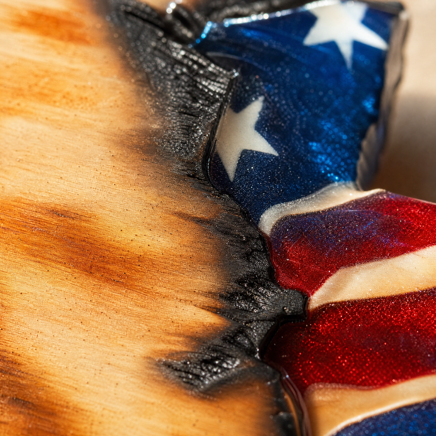Torch-burned wood grain and charred edge